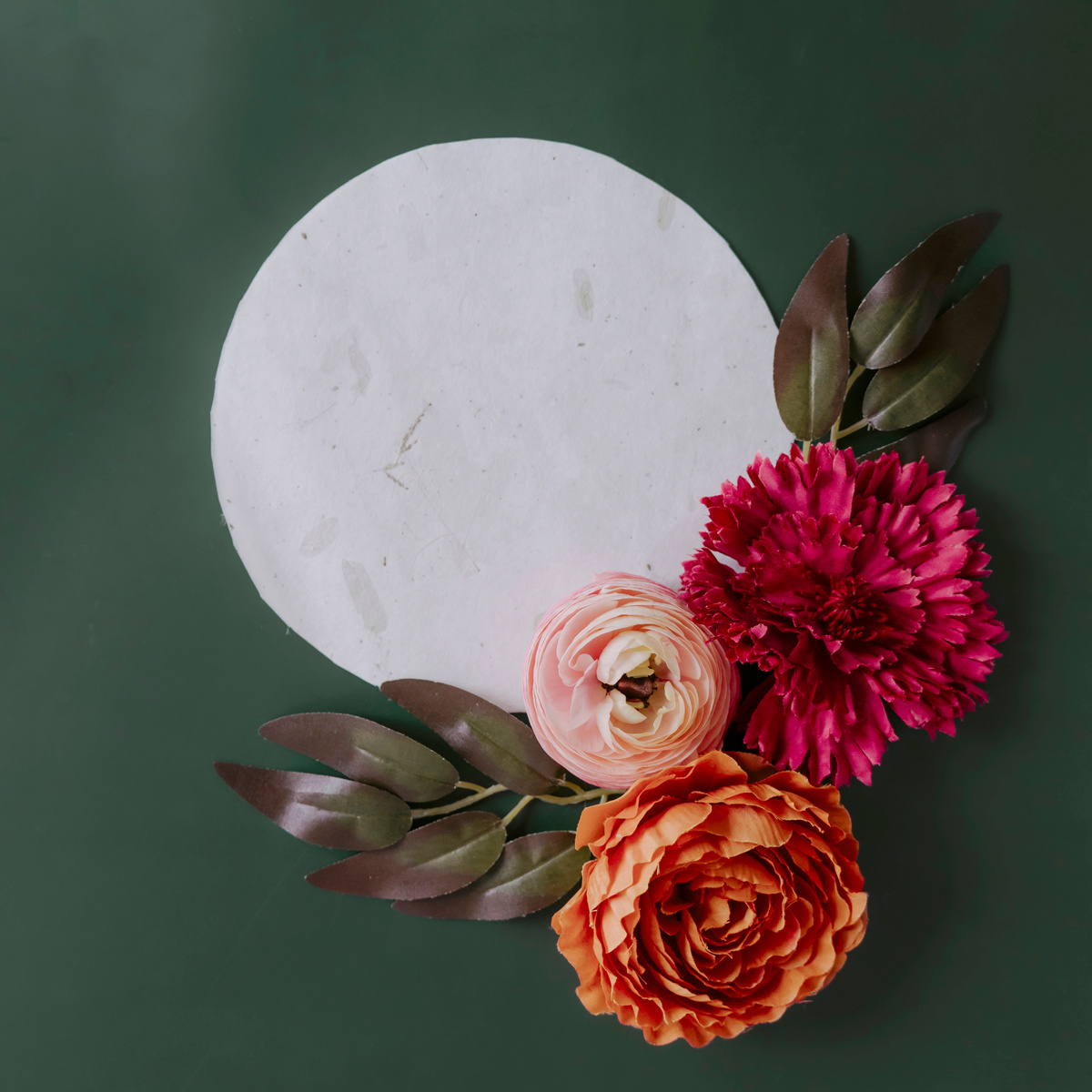 White Round Paper with Flowers Flatlay